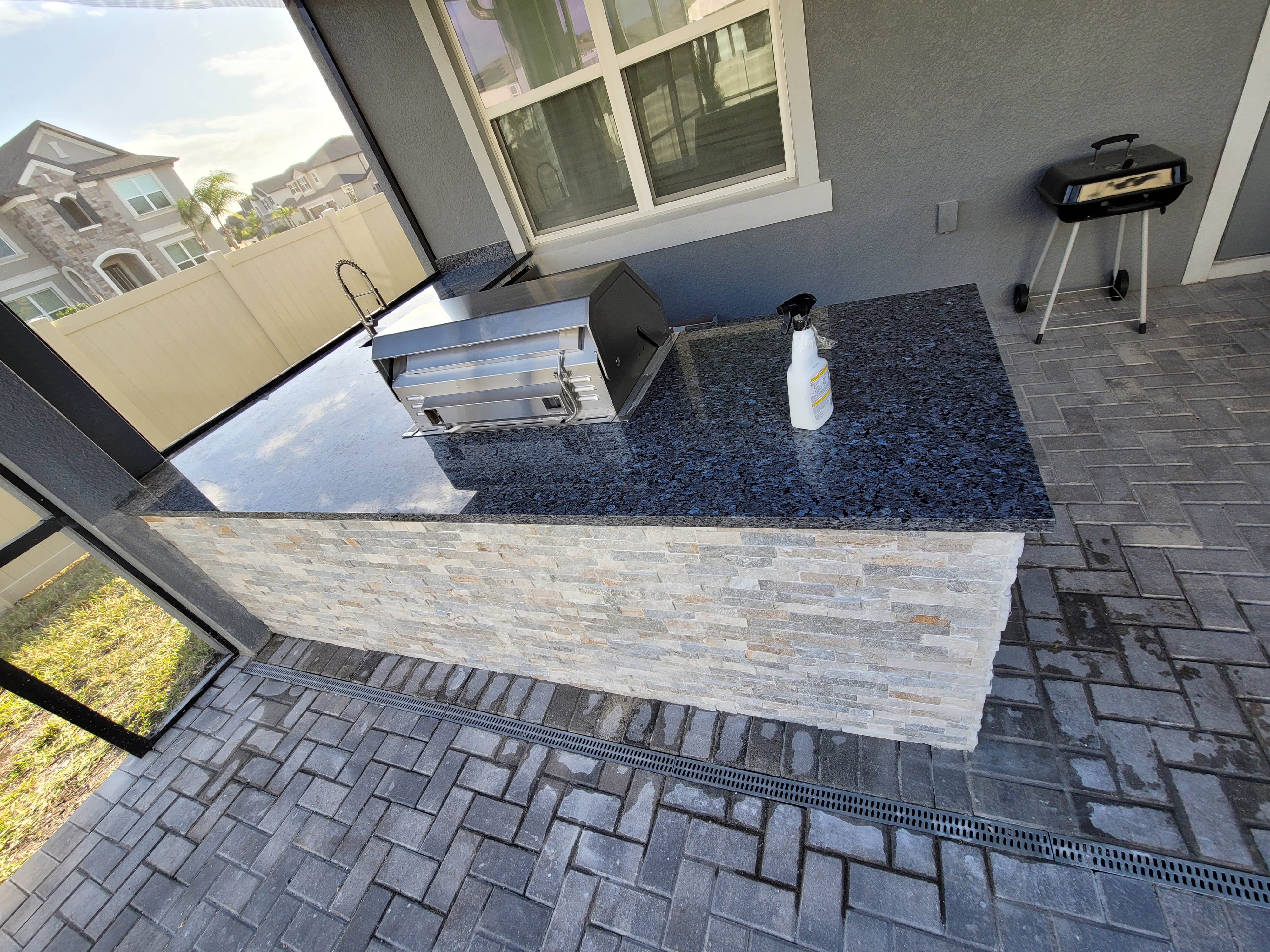 Outdoor Kitchen with Stone Veneer